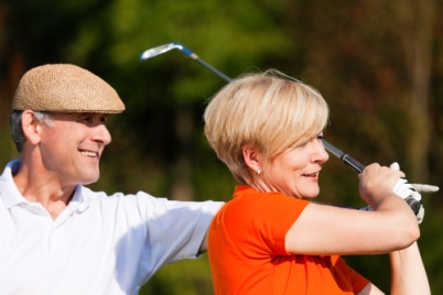 Couple playing golf