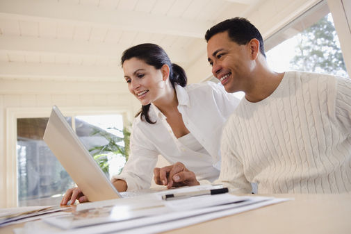 Man and woman with laptop